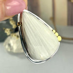 Shimmering White Stone Pendant