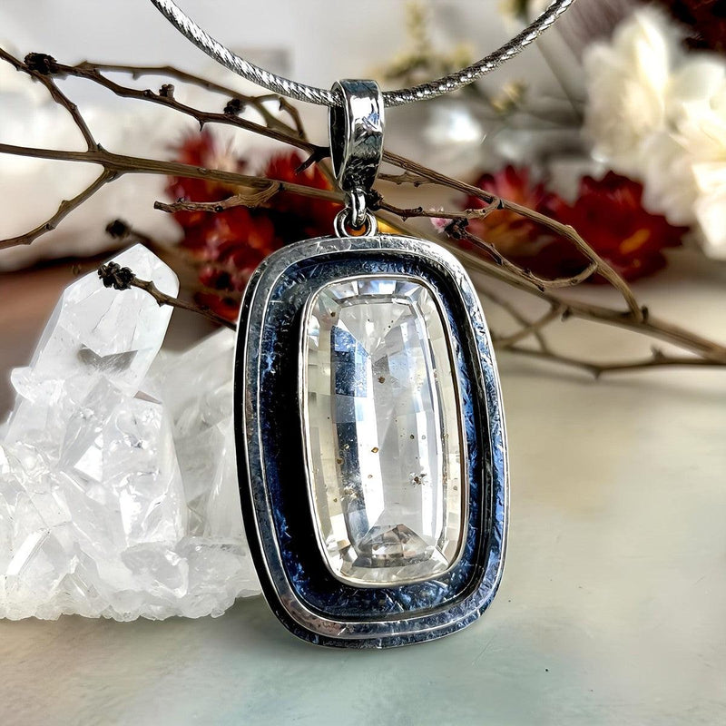 Garnet In Quartz Pendant