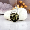 Baltic Green Amber Round Celtic Pendants