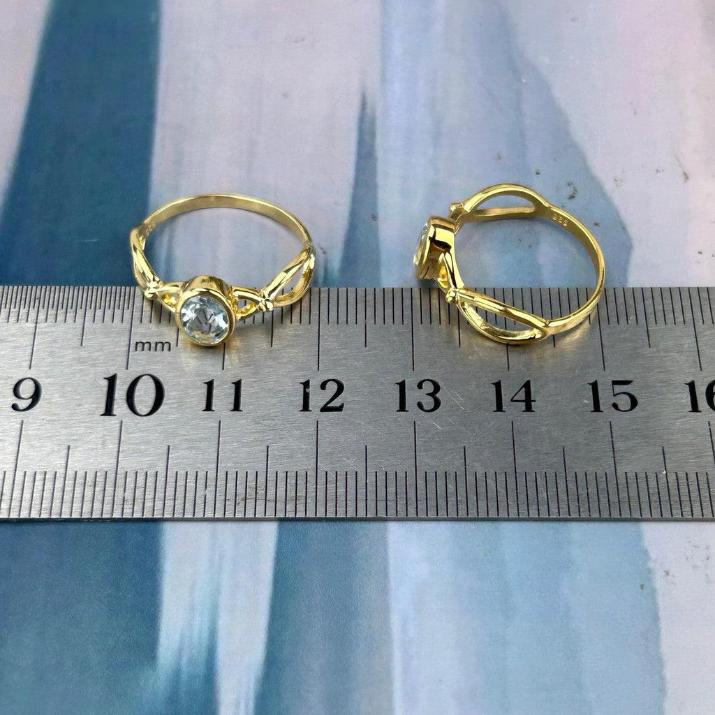 Aquamarine Cross Wave Gold Ring