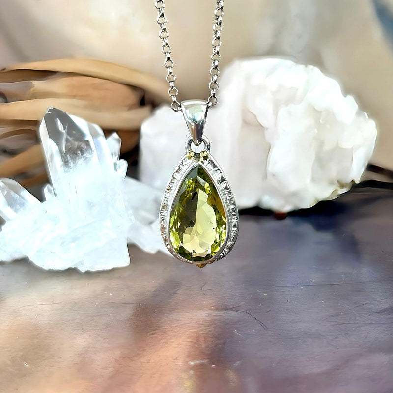 Gold And Silver Gemstone Pendant