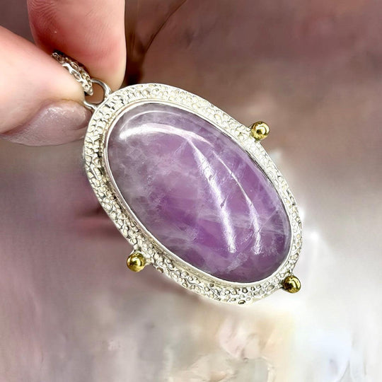 Kunzite Elongated Oval Ornate Etched Silver Pendant
