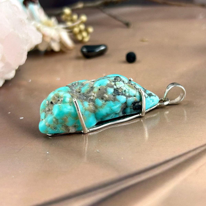 Turquoise Crystal In Silver Setting