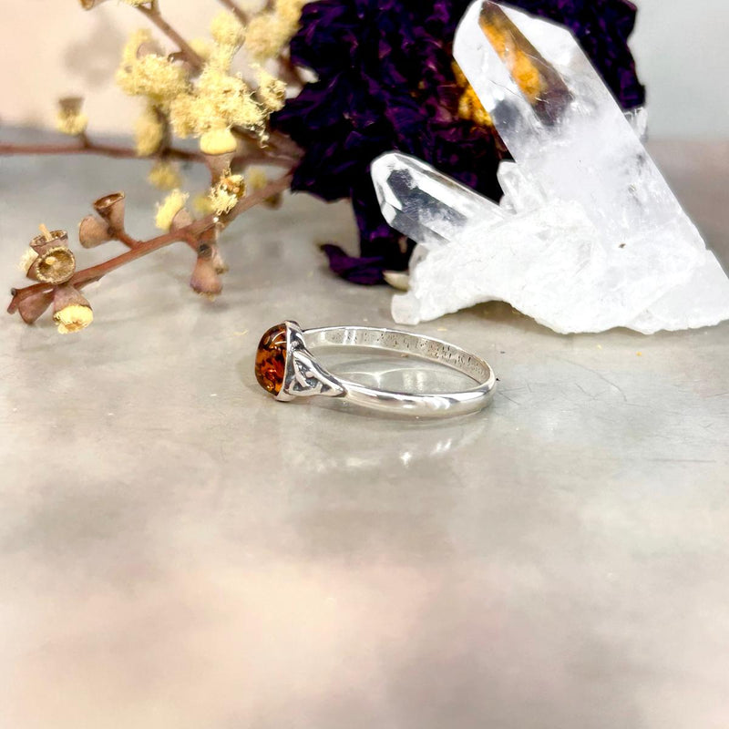 Baltic Cognac Amber Oval Triquetra Ring