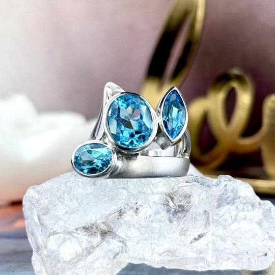Swiss Blue Topaz Three Stone Ring by Janusz Szkutnik