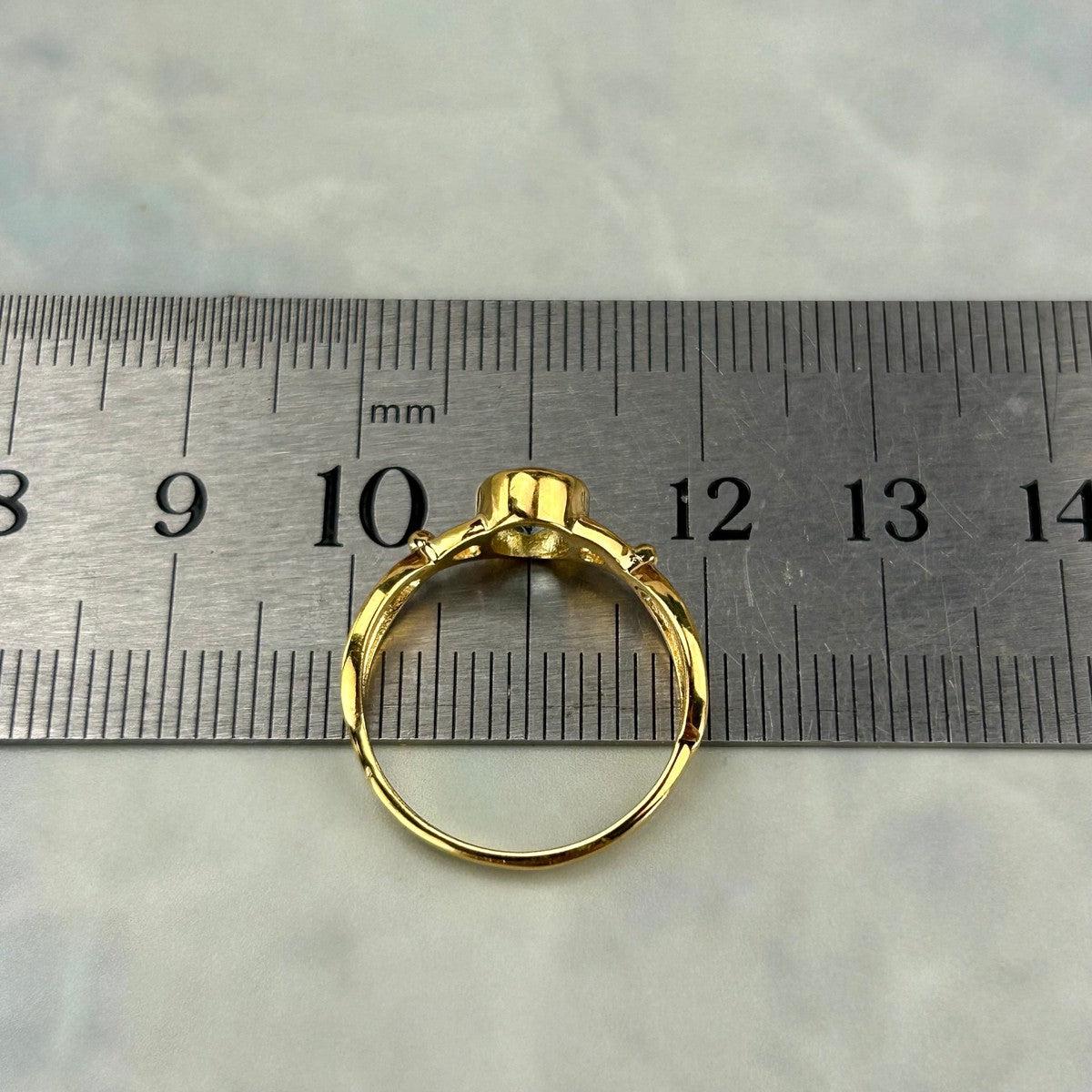 Oval Cut Blue Topaz Ring