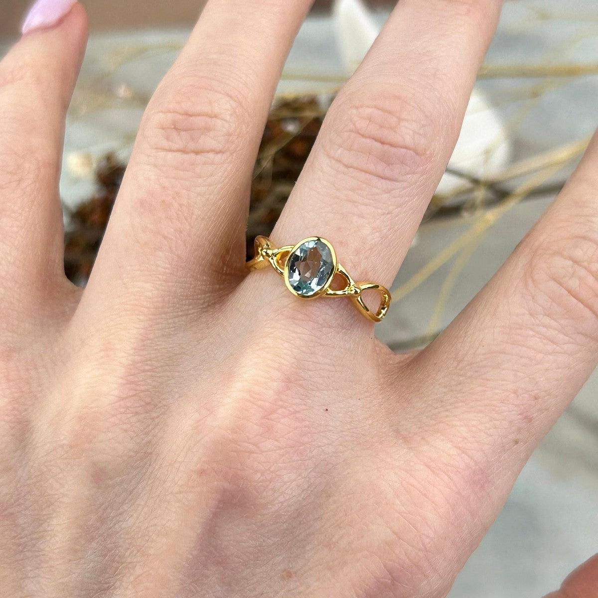 Delicate Blue Topaz Ring
