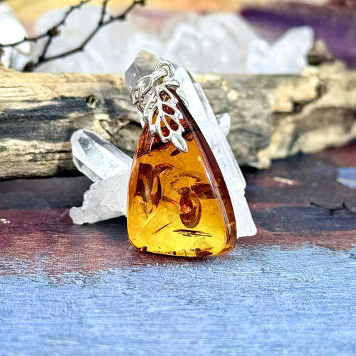 Ornate Setting Amber Pendant