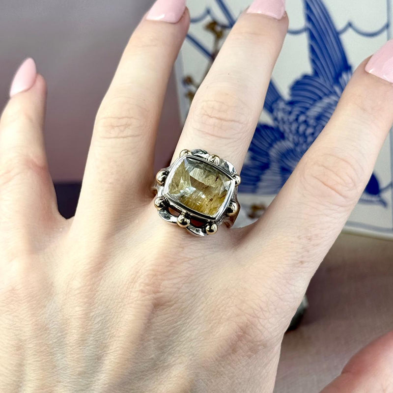 Blue Topaz With Golden Rutile Inclusions
