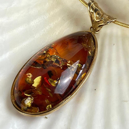 Baltic Amber Elongated Teardrop Gold Pendant