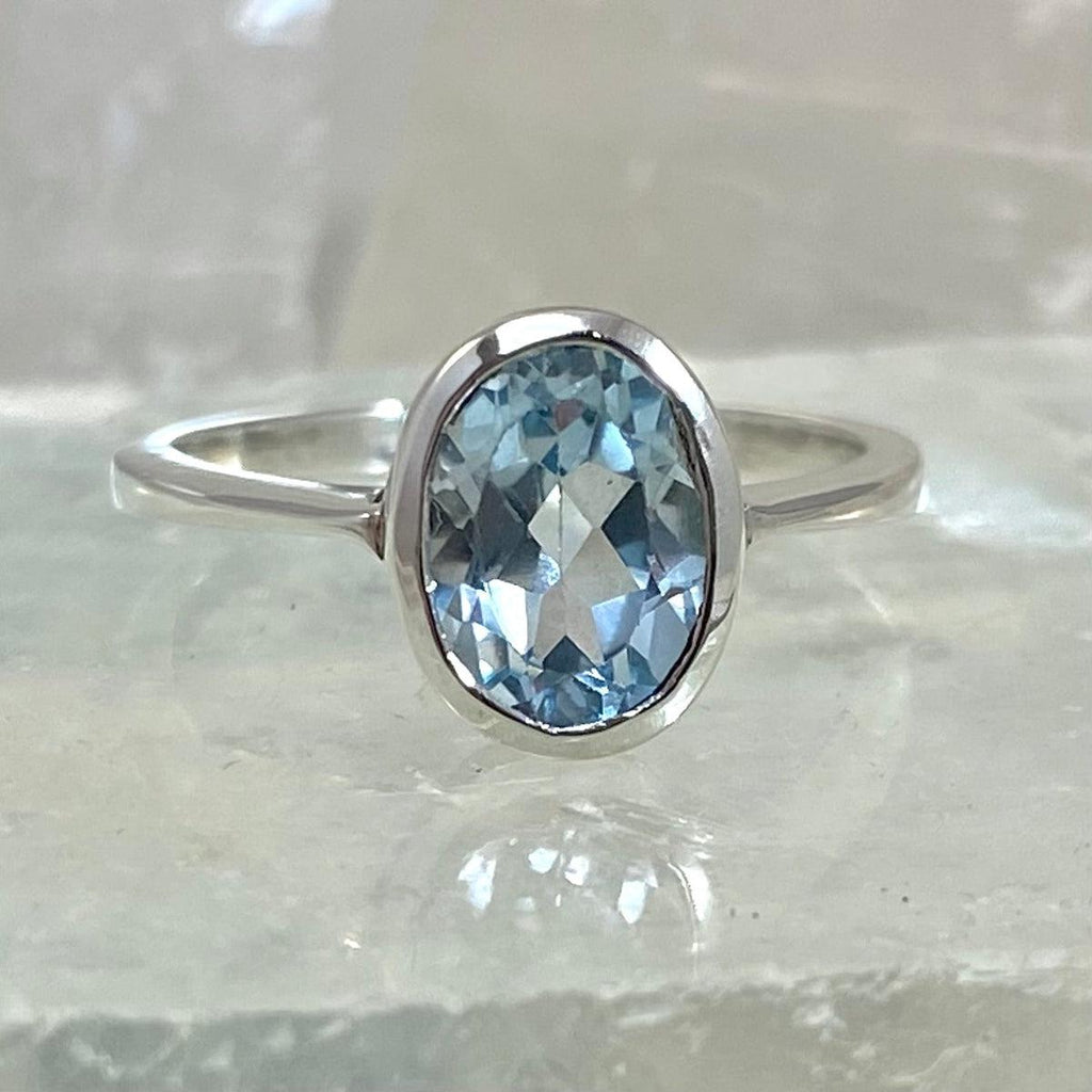 Oval Brilliant Cut Blue Topaz Ring