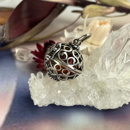 Amber Bead In Sterling Silver Cage Pendant